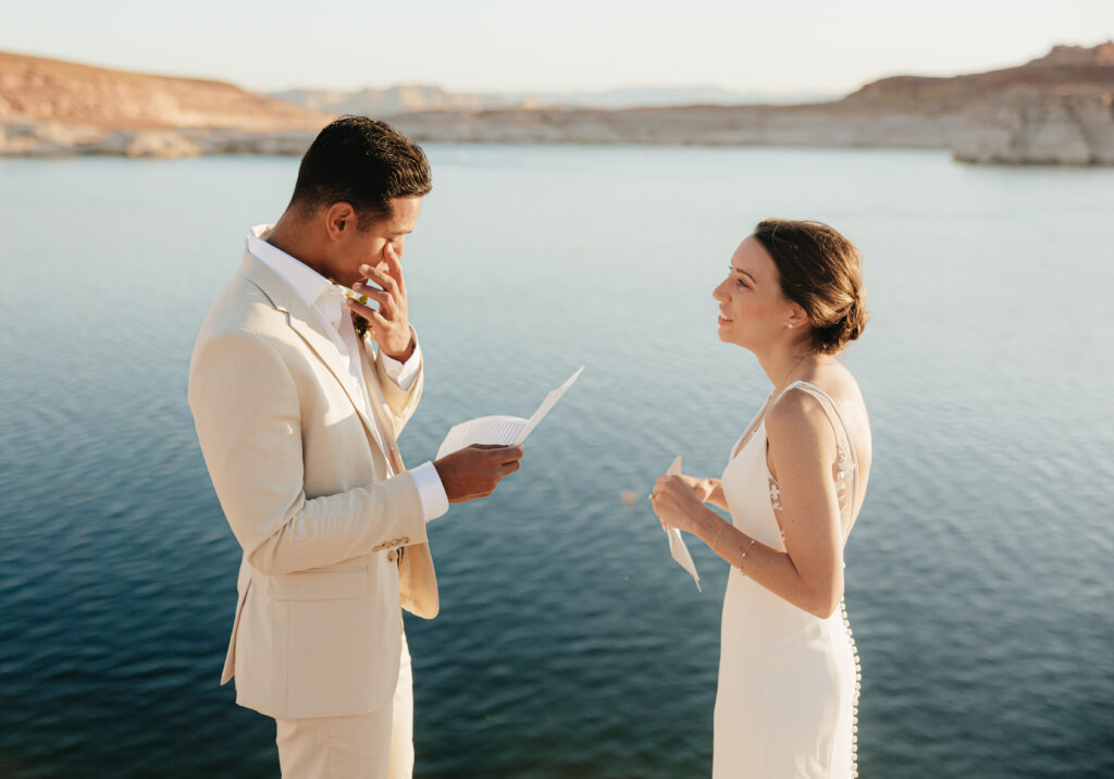Breathtaking Lake Powell Elopement in southern Utah. A houseboat venue & roaming canyons on their wedding day