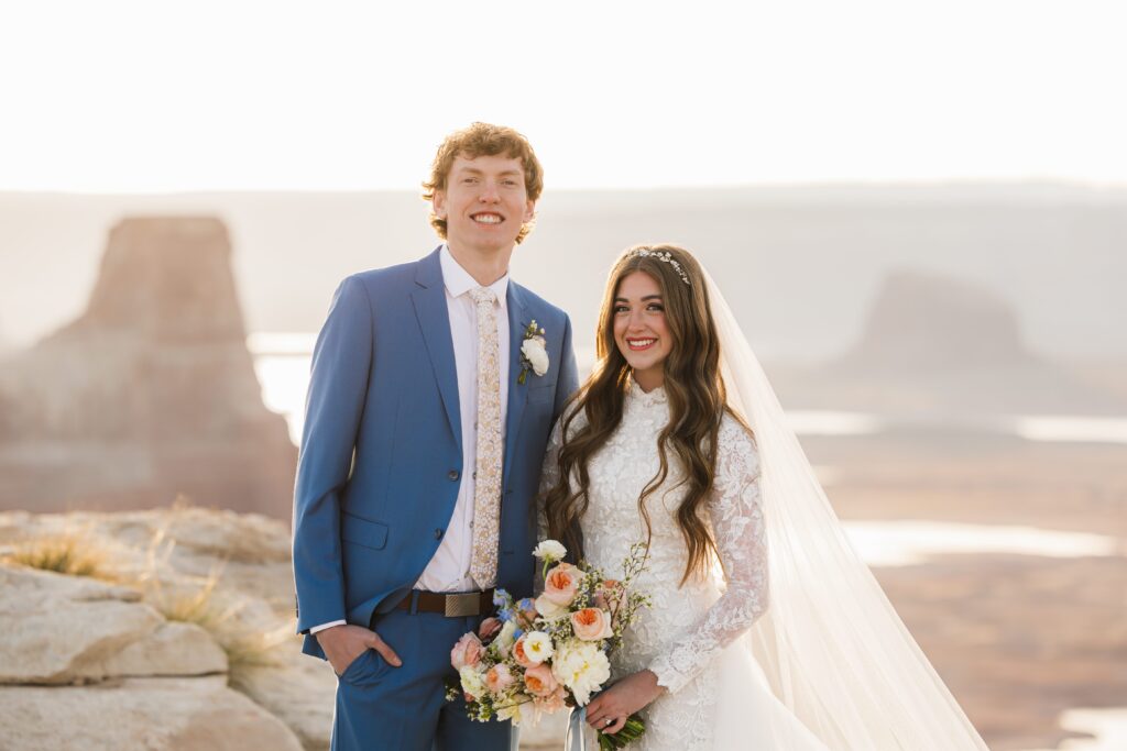 Off-the-grid adventure first look & wedding portraits in northern Arizona/Southern Utah. Above Lake Powell & near Amangiri resort, these two enjoyed the cliff views at sunrise. Best desert elopement location for luxury wedding photos