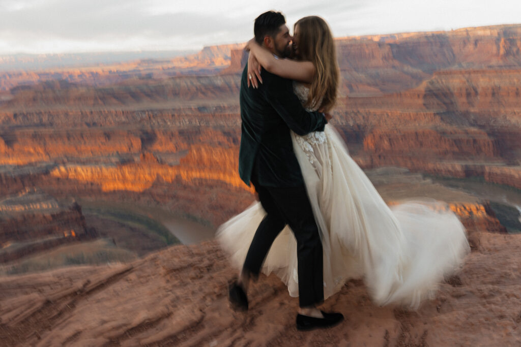 luxury romantic moab desert wedding at red earth venue and dead horse point state park | best of utah wedding photographers and venues 