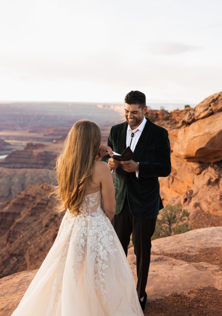 luxury romantic moab desert wedding at red earth venue and dead horse point state park | best of utah wedding photographers and venues 